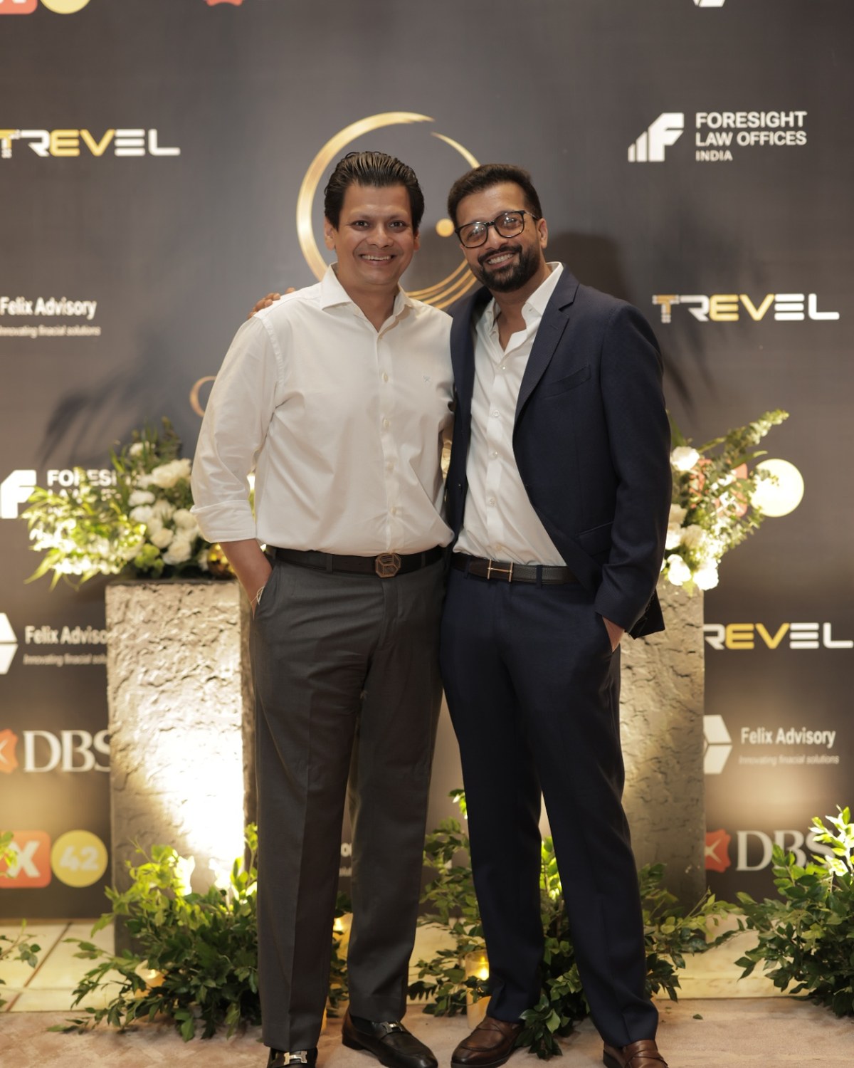 Sahil Jindal with a colleague at the Trevel launch backdrop in Gurugram