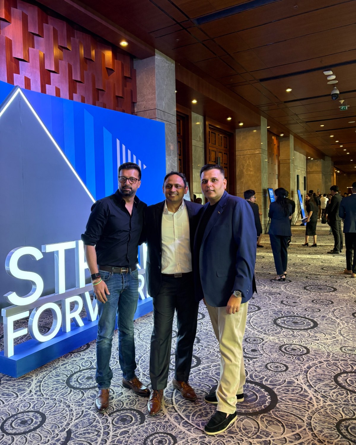 Sahil Jindal with two founders at a Stride Forward summit in Gurugram